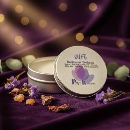 Deodorant tin with lid open on a purple background