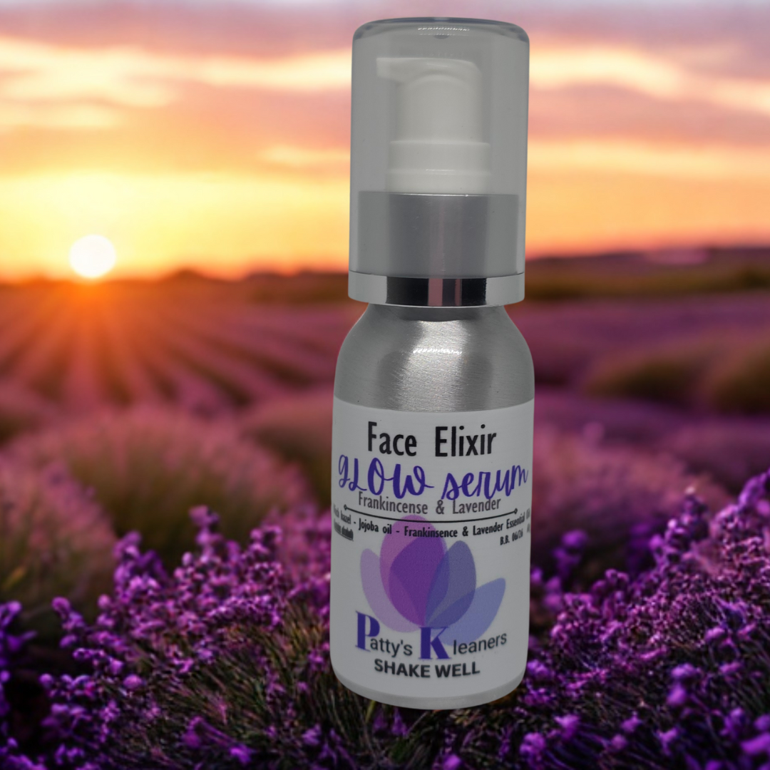 Bottle of 'Face Elixir Glow Serum' with lavender field and sunset in the background